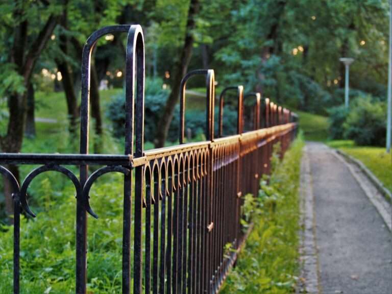 Small metal gate with mesh for park or yard fencing